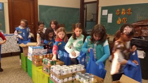 Girl Scouts pack bags
